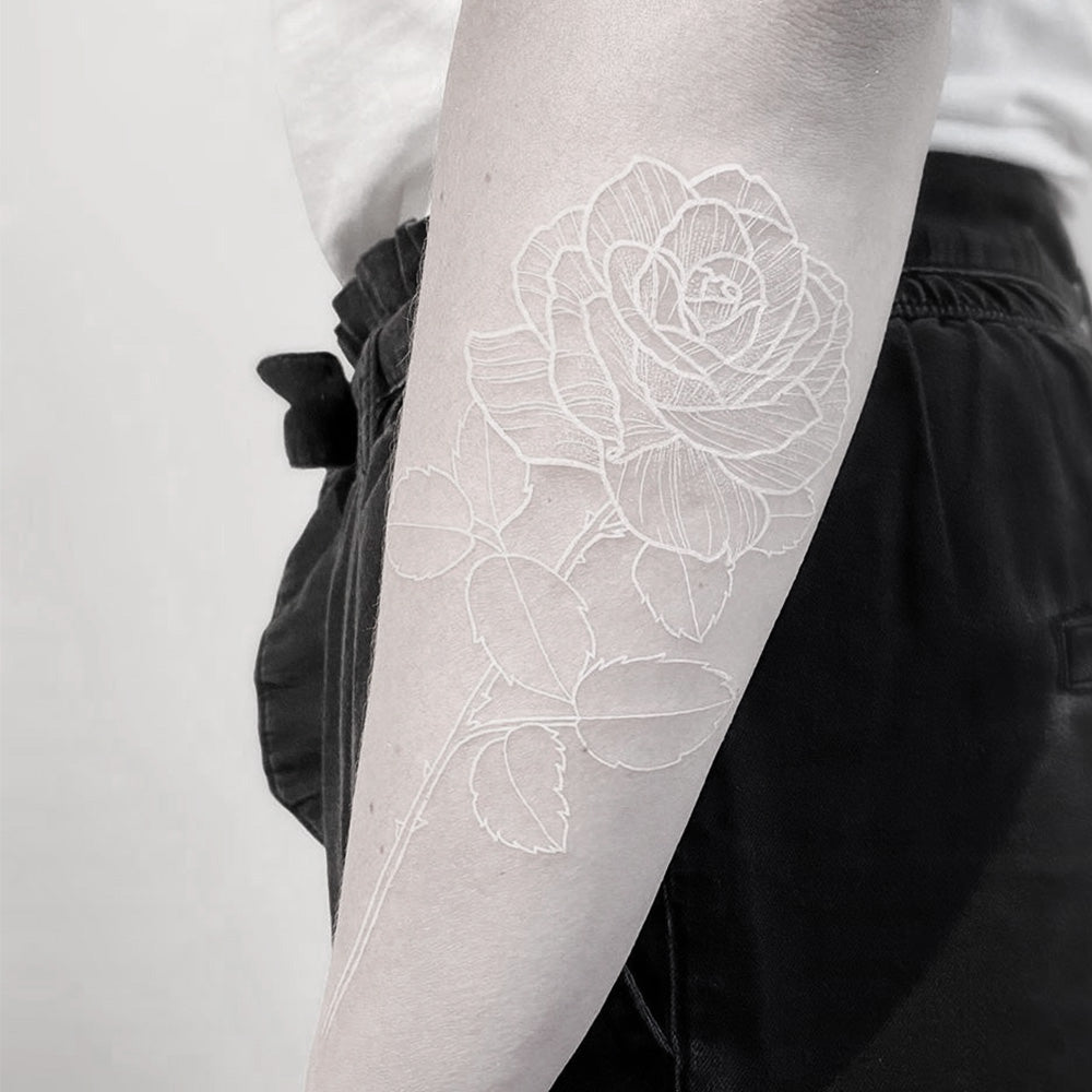 Can You Tattoo White Over Black? Complete Guide to White Ink Tattoos & Fading